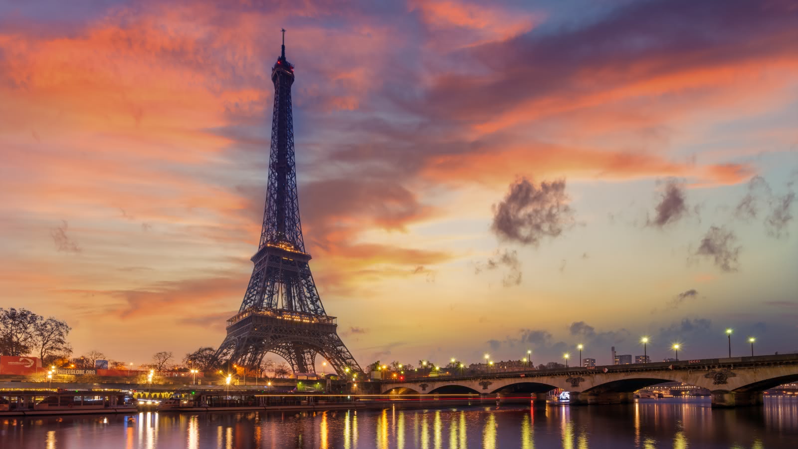 eiffel tower seen during the paris city of lights evening tour