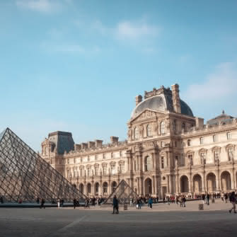Visiting the Louvre grounds during the Paris Free Tour